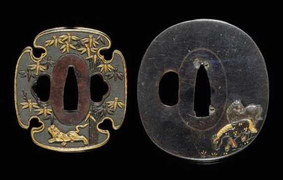 Appraisal: TWO SHAKUD TSUBA WITH GOLD HORSES AND A TIGER IN