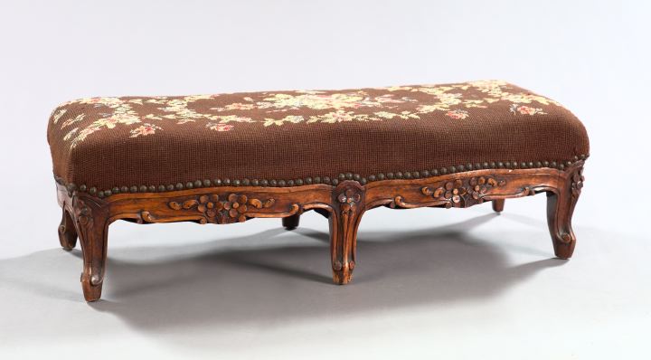 Appraisal: Provincial Louis XV-Style Fruitwood Stool the rectangular floral needlework seat