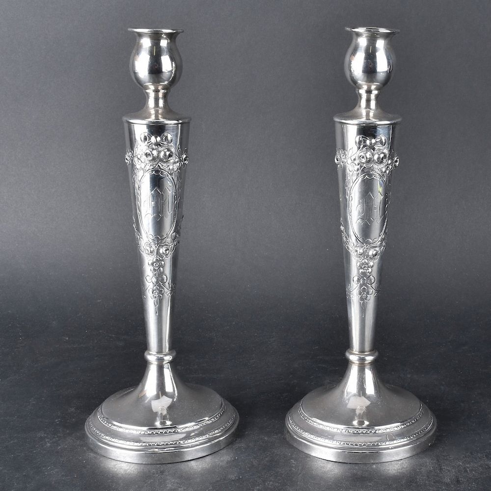 Appraisal: Sterling Candlesticks Pair of Sterling Silver Candlesticks with Raised Floral