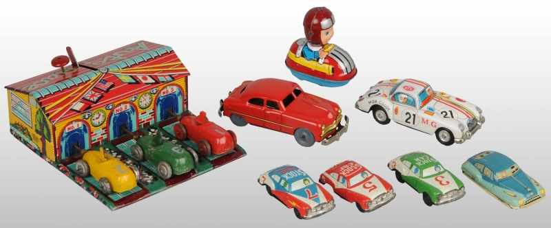 Appraisal: Miscellaneous Tin Litho Vehicle Toys Description Japanese Includes Auto Race