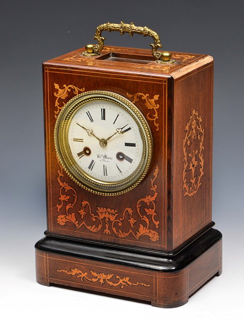 Appraisal: A TH CENTURY FRENCH ROSEWOOD MANTEL CLOCK the white enamel