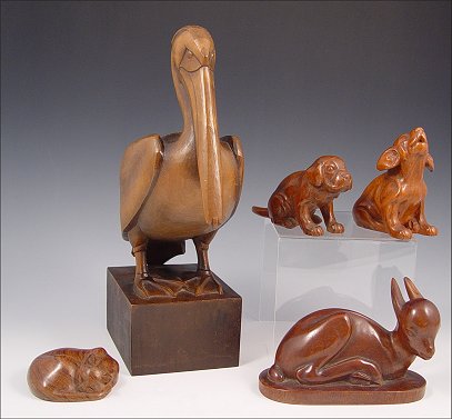 Appraisal: HUGGLER-WYSS Hans Swiss - Carved wood animals pelican sleeping cat