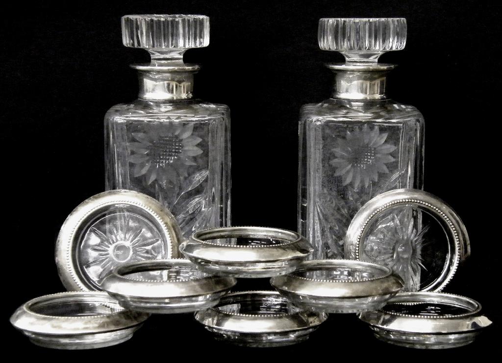 Appraisal: Pair of silver mounted cut glass whiskey decanters maker R