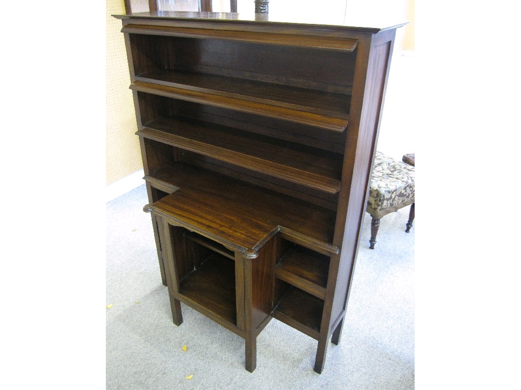 Appraisal: Mahogany bookcase each shelf with hinged top flap with protruding