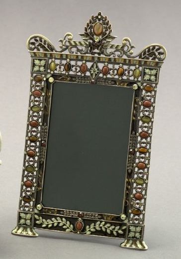 Appraisal: Elaborate Reticulated Enameled and Jewel-Set Gilt-Metal Photograph Frame the frame