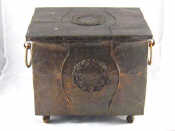 Appraisal: A beaten copper cased wooden coal box in the Arts