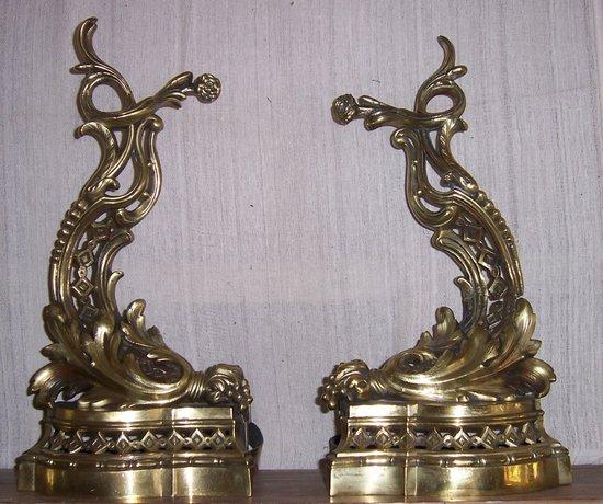 Appraisal: A pair of th Century gilt brass andirons with acanthus