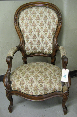 Appraisal: VICTORIAN WALNUT ARMCHAIR Rococo Revival design American last quarter of