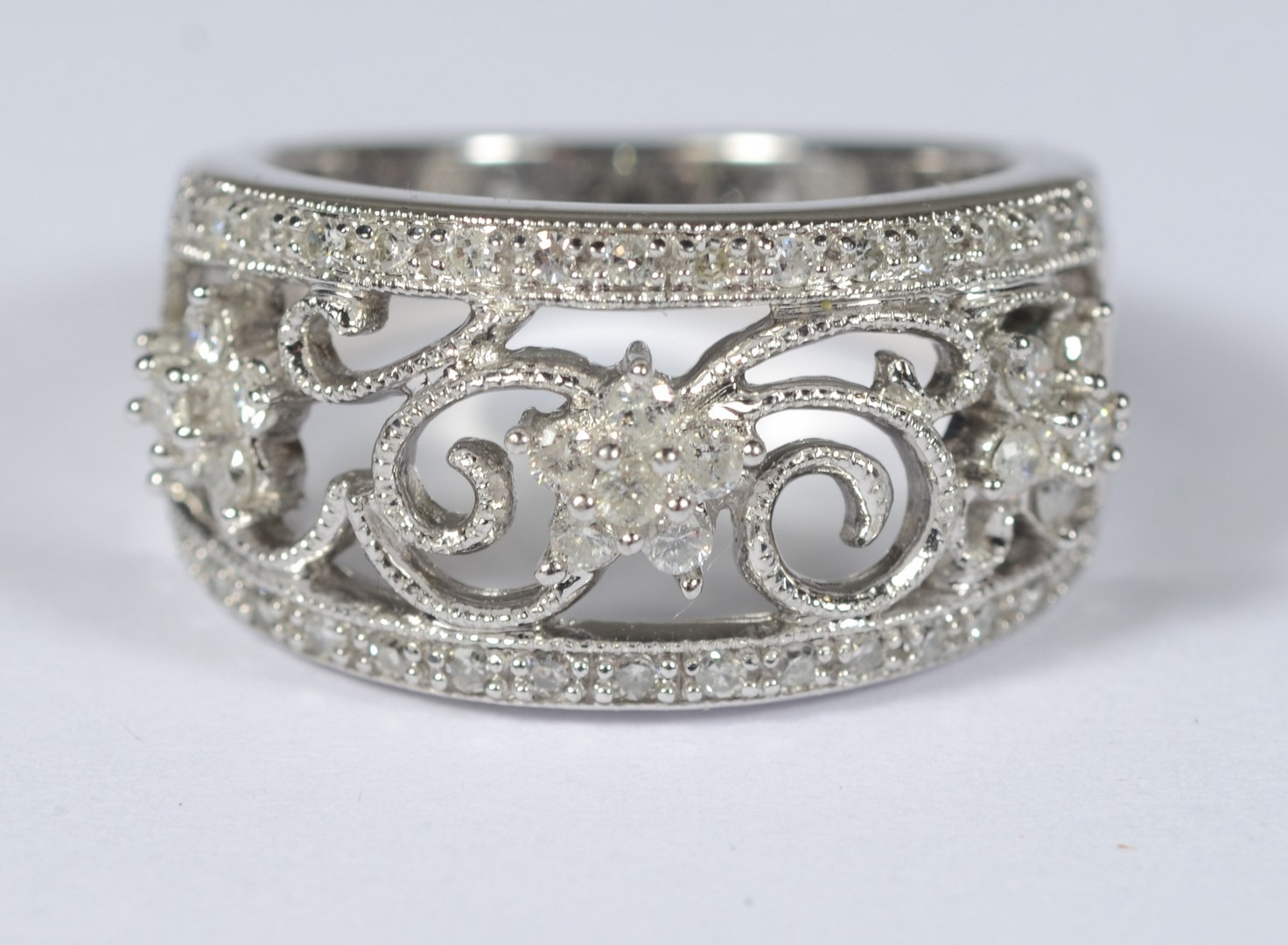 Appraisal: K WG filigree ring with small diamonds dwt size