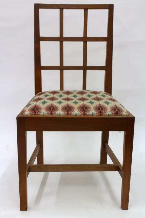 Appraisal: An Australian walnut framed standard chair by Peter Waals the