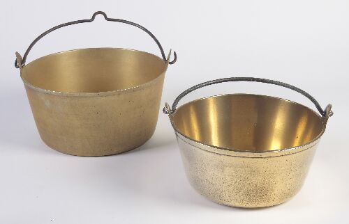 Appraisal: A large th century brass jelly pan with iron loop