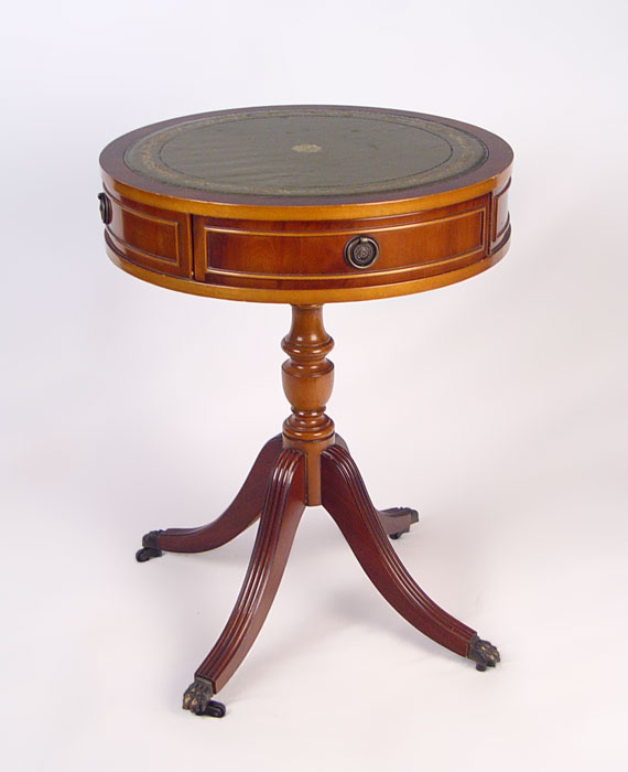 Appraisal: GEORGE III STYLE MAHOGANY DRUM TABLE Green leather top drawers