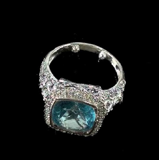 Appraisal: Lady's Fourteen-Karat White Gold Blue Topaz and Diamond Ring composed