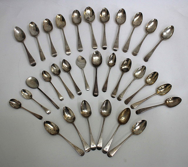 Appraisal: A PAIR OF GEORGE III SILVER DESSERT SPOONS maker G