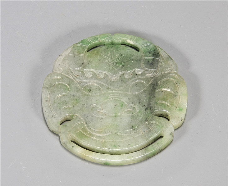 Appraisal: Chinese Circular form carved jadeite double sided mask plaque D