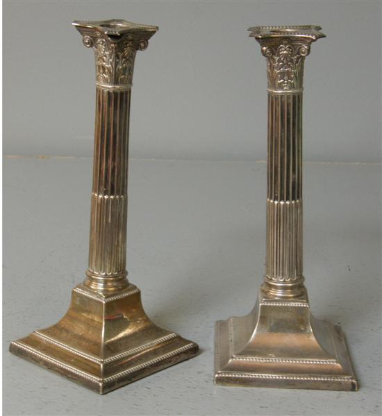 Appraisal: Pair of Victorian silver Corinthian column candlesticks Sheffield loaded h