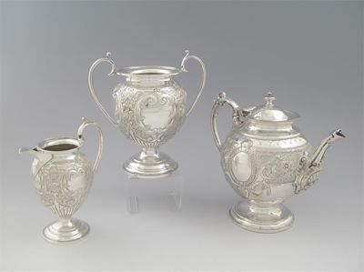 Appraisal: A Victorian plated teapot and a plated cream jug and