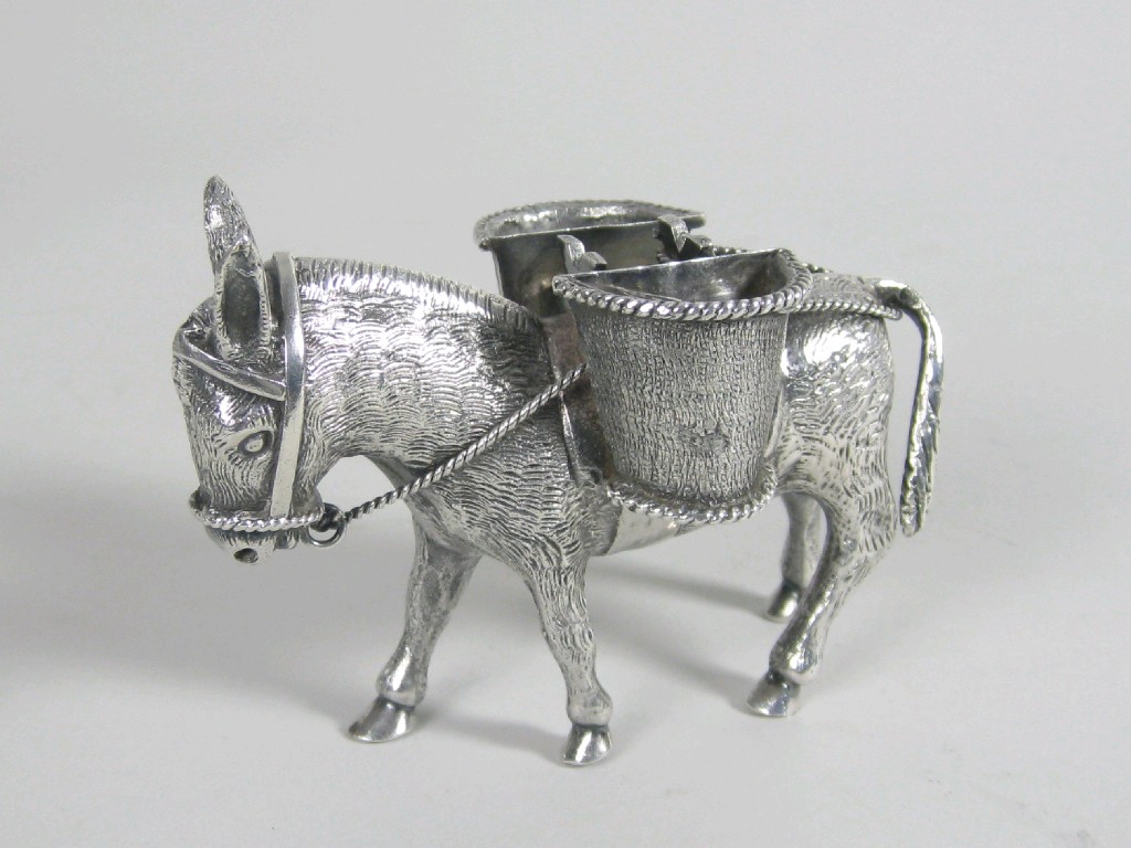 Appraisal: A Mexican silver Table Ornament modelled as a donkey with