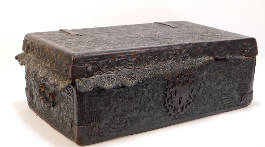 Appraisal: ENGLISH FIGURAL TOOLED LEATHER STORAGE TRUNK England th CenturyDecorated with