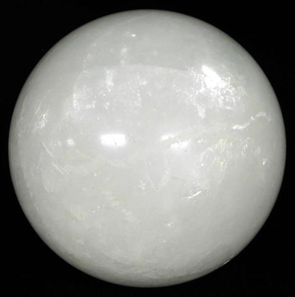 Appraisal: Brazilian Rock Crystal ball th C polished sphere with white