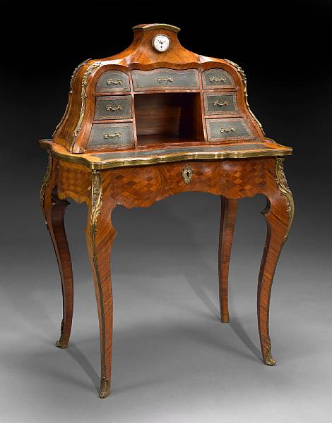 Appraisal: A Louis XV style gilt bronze mounted parquetry inlaid walnut