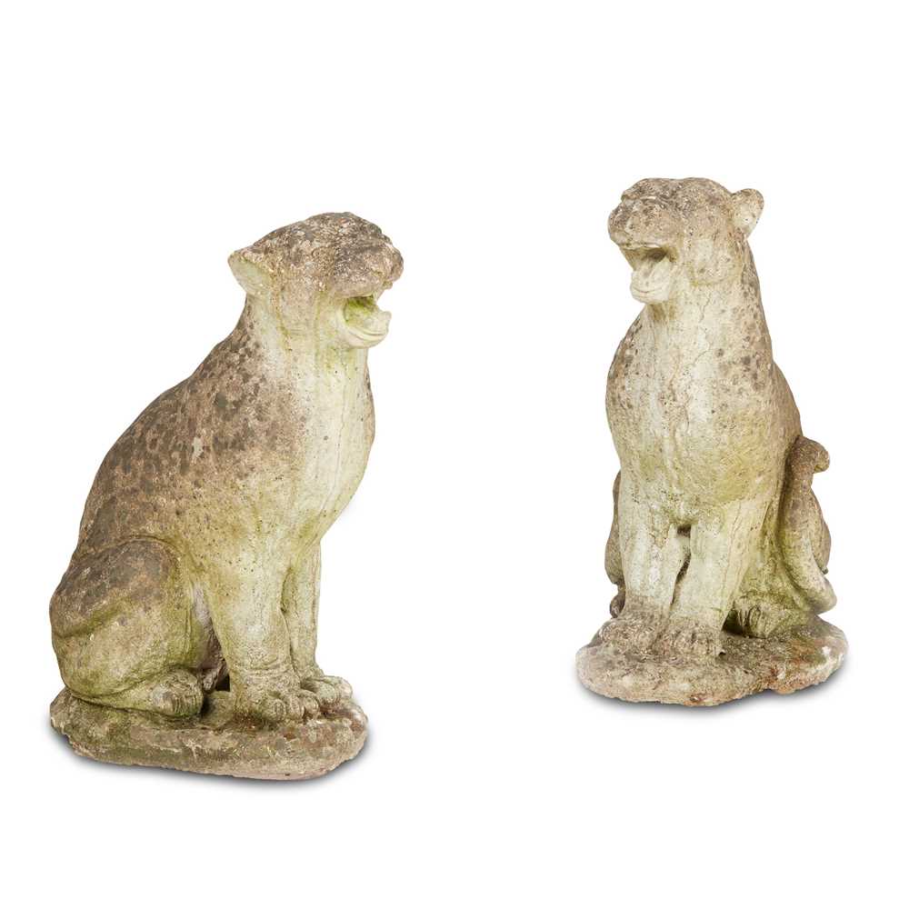 Appraisal: PAIR OF COMPOSITION STONE JAGUARS MODERN in seated position on