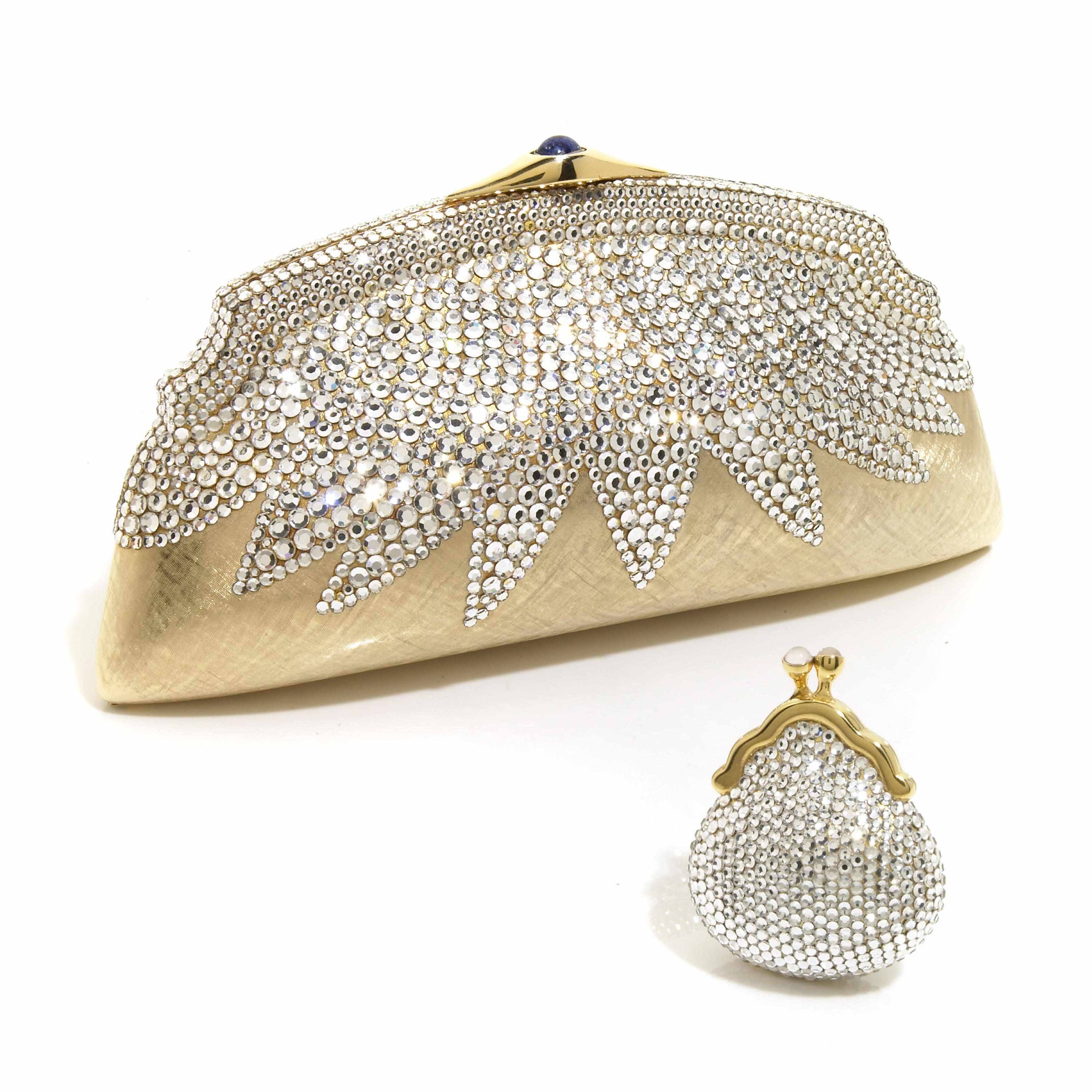 Appraisal: A silver crystal and gold colored metal bulged purse together