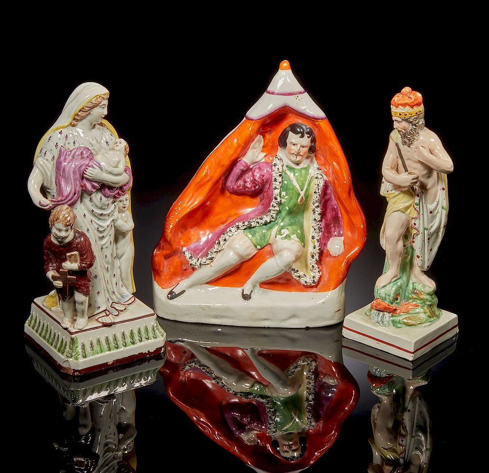 Appraisal: Three Staffordshire Figures Three Staffordshire figures comprising a standing woman