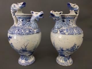 Appraisal: Dutch Delft wine ewer Pair of Dutch Delft blue and