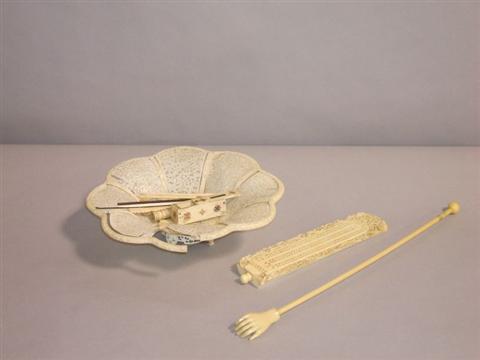 Appraisal: CHINESE EXPORT IVORY RETICULATED FLORIFORM DISH Circa the dish divided