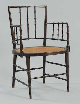 Appraisal: A Regency Style Carved Faux Bamboo Arm Chair The carved