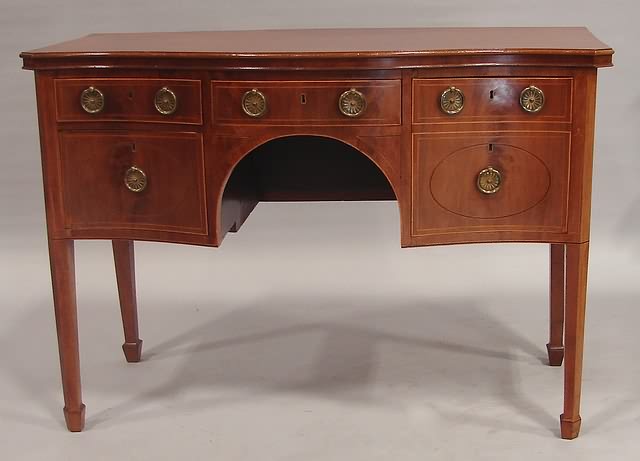 Appraisal: Mahogany sepentine front with line inlay three drawers and cellerette