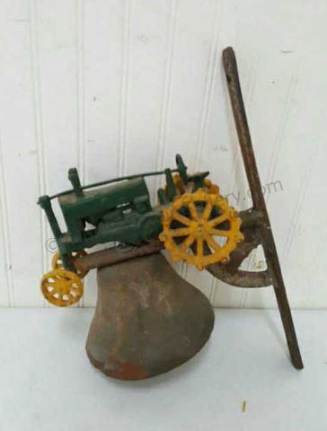 Appraisal: Vintage antique style cast iron bell with a John Deere