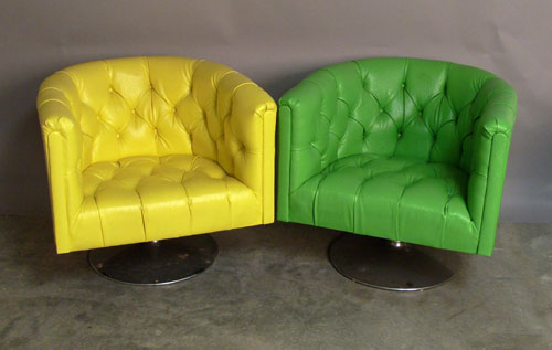 Appraisal: Three modern swivel chairs