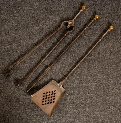 Appraisal: A set of early th Century burnished steel fire irons