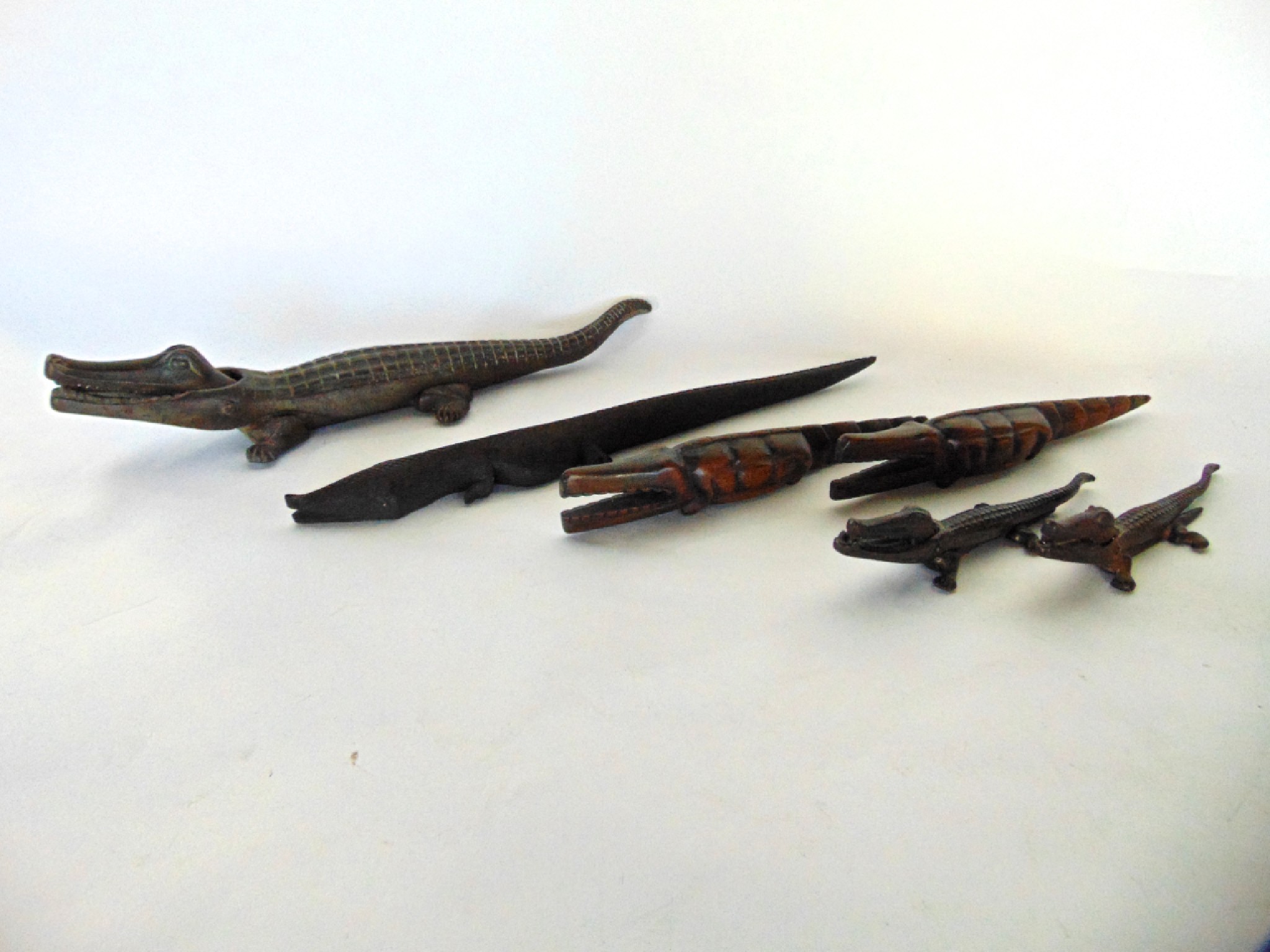 Appraisal: Three vintage cast iron nut crackers in the form of