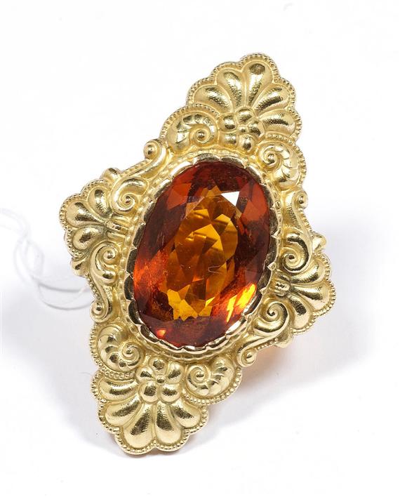 Appraisal: GOLD AND CITRINE RING Yellow gold g Very decorative large