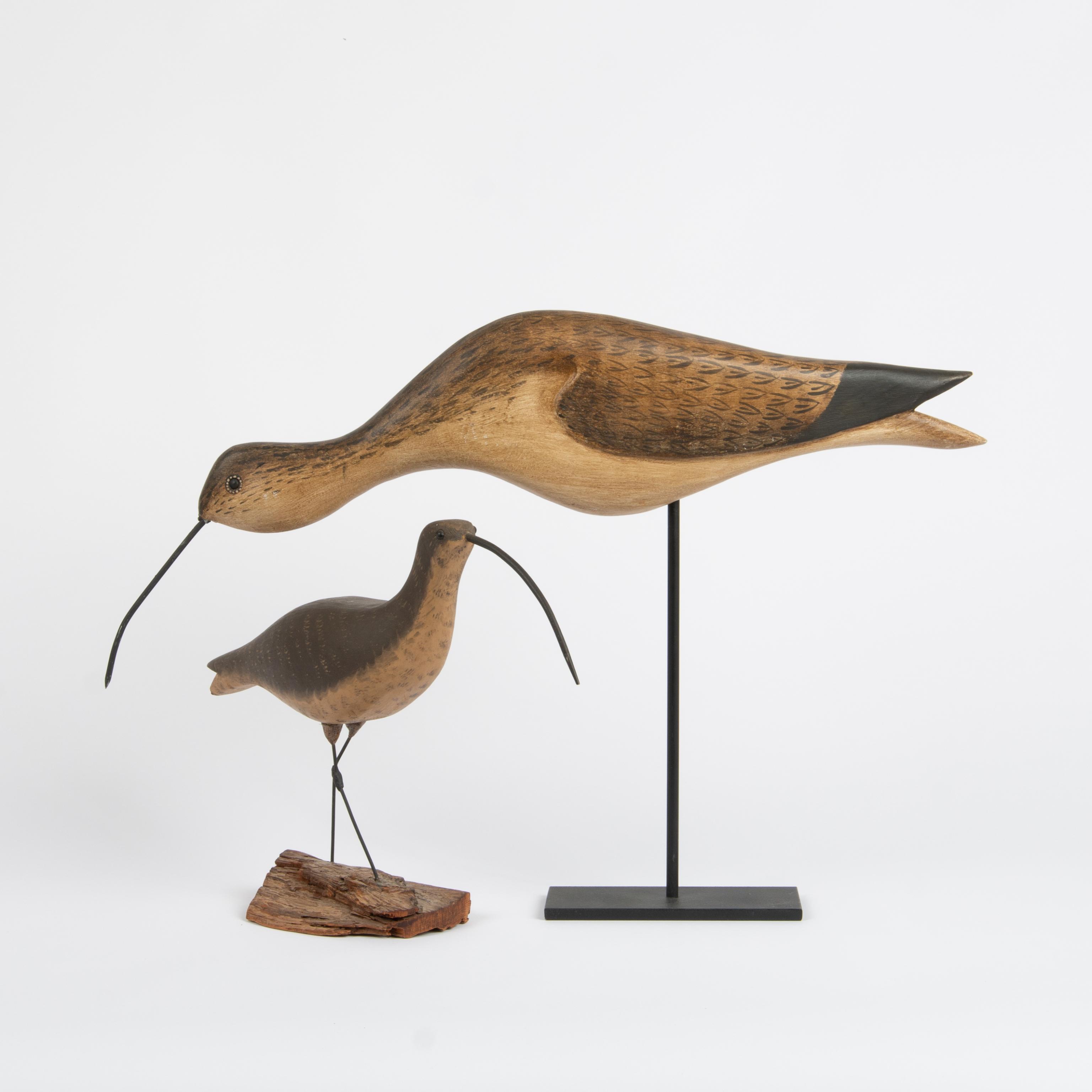 Appraisal: PAIR OF FOLK ART CURLEW SHOREBIRDS Two hand-carved and painted