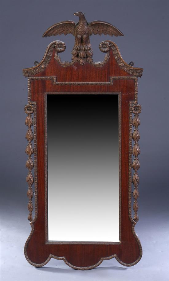 Appraisal: FEDERAL STYLE MAHOGANY AND PARCEL-GILT WALL MIRROR th century Scrolling