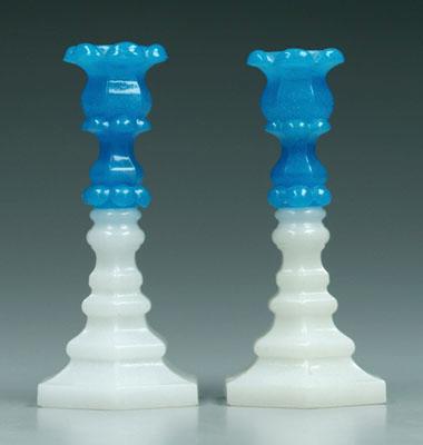 Appraisal: Pair Sandwich glass candlesticks clambroth below blue sockets octagonal bases