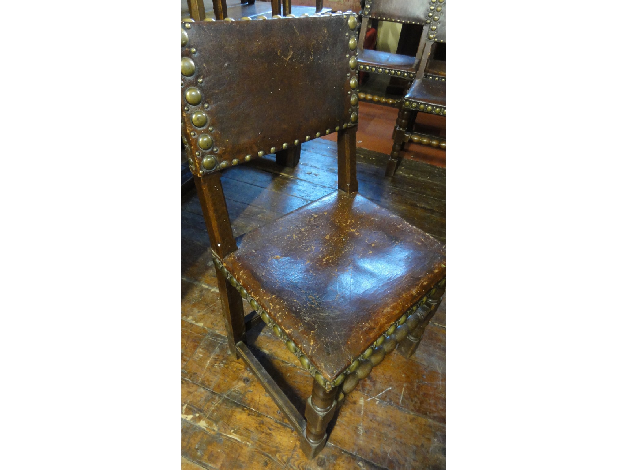 Appraisal: A set of six oak Cromwellian style dining chairs with