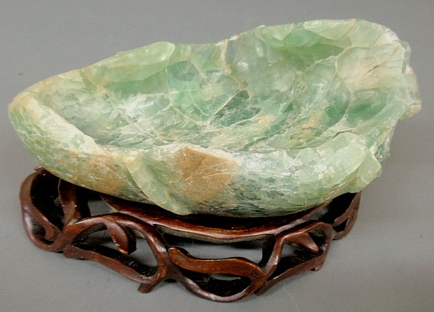 Appraisal: - Asian green hard stone bowl as found resting on