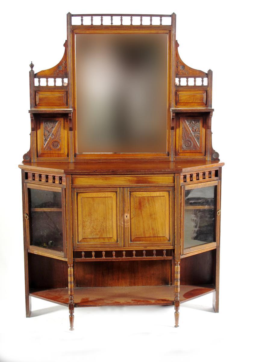 Appraisal: An Aesthetic Movement walnut cabinet