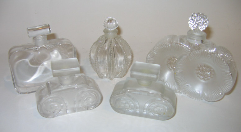 Appraisal: FIVE FRENCH GLASS PERFUME BOTTLES Lalique frosted and clear glass