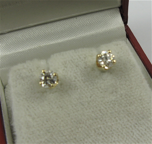 Appraisal: PAIR OF DIAMOND AND K GOLD EAR STUDS each set