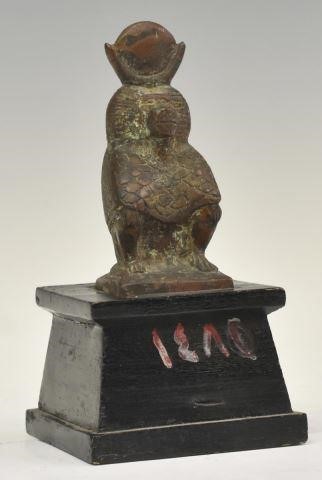 Appraisal: Egyptian patinated bronze amulet Thoth as a baboon wearing headdress