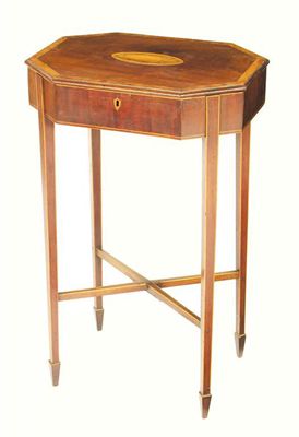 Appraisal: A late George III mahogany sewing table with satinwood crossbanding