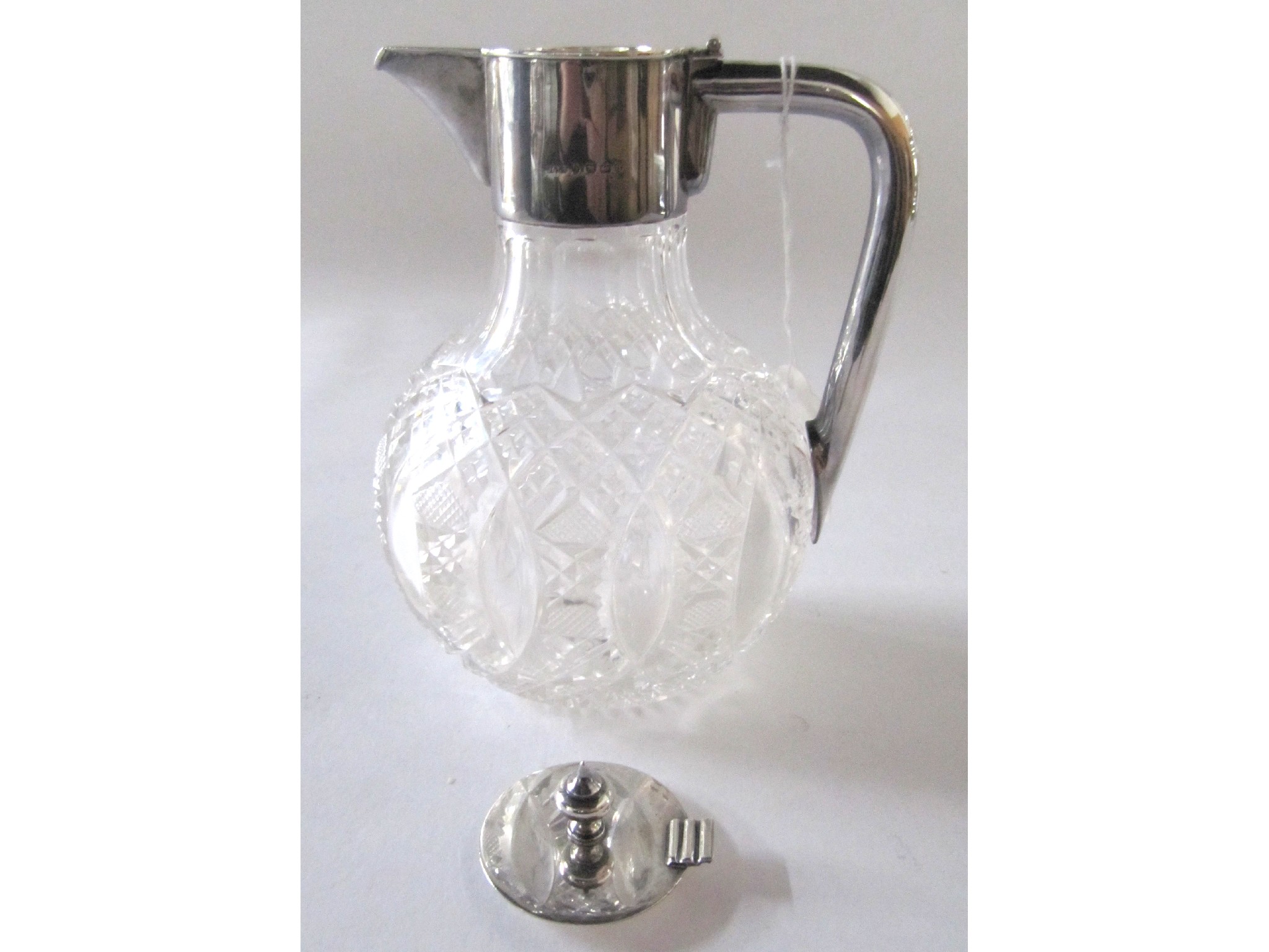 Appraisal: A silver topped claret jug lid detached Birmingham