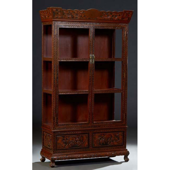 Appraisal: Chinese Carved Mahogany Display Cabinet th c the arched canted