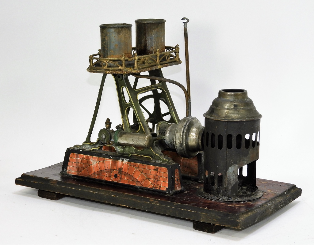 Appraisal: ANTIQUE GERMAN VERTICLE STEAM POWERED ENGINE Germany Early th CenturyRetains